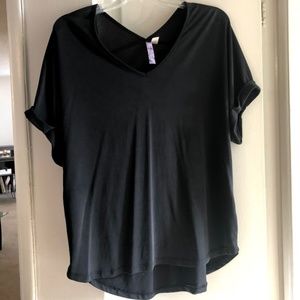 Francesca’s black flowy blouse